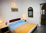 Grotto Villas in Firostefani, Thira; room view
