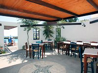 Kalimera Hotel in Akrotiri, Thira; the atrium restaurant