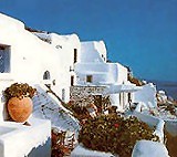 Traditional architectural style of Santorini: little white houses on the cliffs