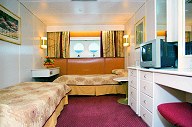 Superior outside cabin with portholes on the 'Aquamarine' cruise vessel