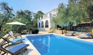 The pool terrace of the Villa Andromeda in Paxi