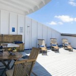 The balcony with private whirlpool bath of an 'SG' suite