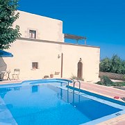 View of the villa and its pool